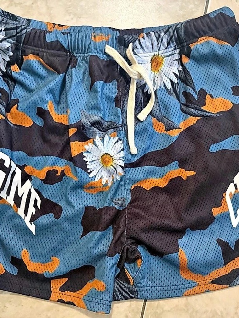 Civil Regime Wild Daisy Camo Mesh Shorts in Blue & Black